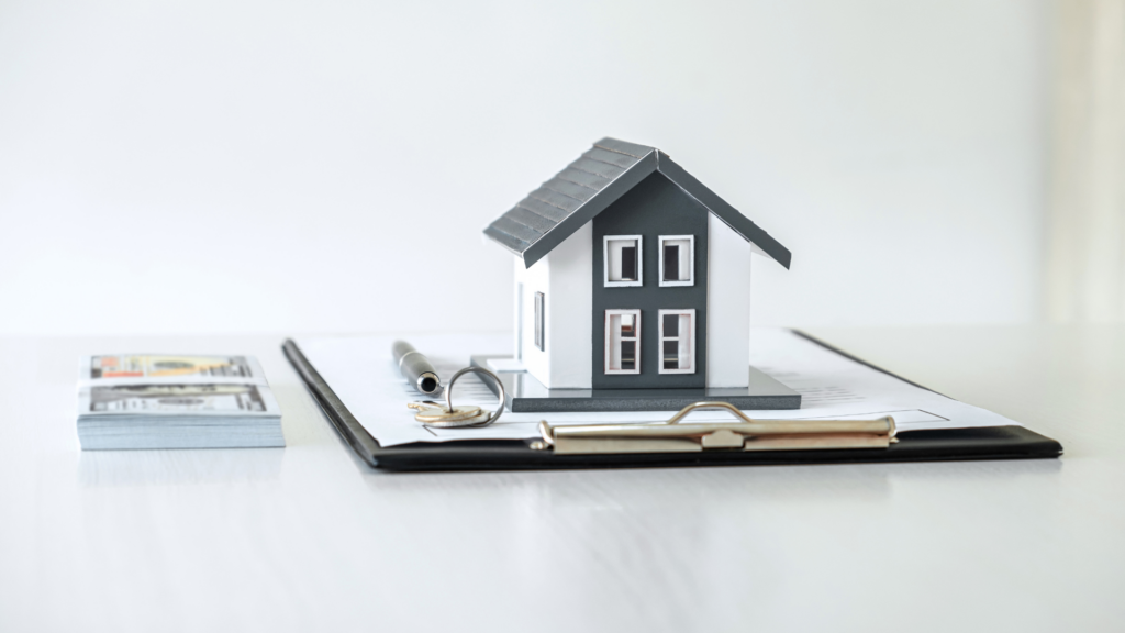 A house with financial symbols including clocks, calculators, and currency, symbolising the concept of interest-only remortgages and their time-sensitive, financial implications.